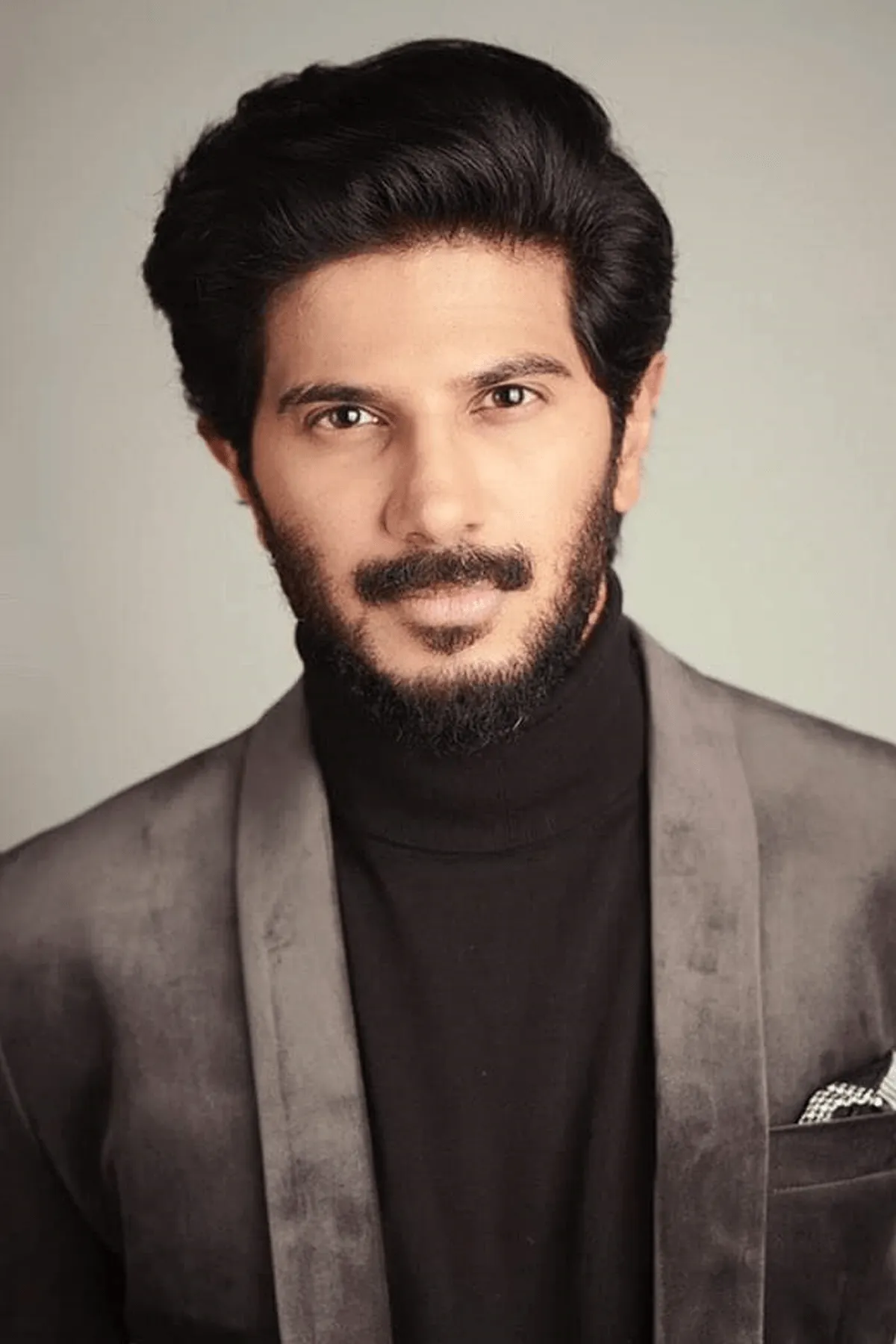 Dulquer Salman In Dark Grey Jacket, Black Polo Neck, Black Trousers